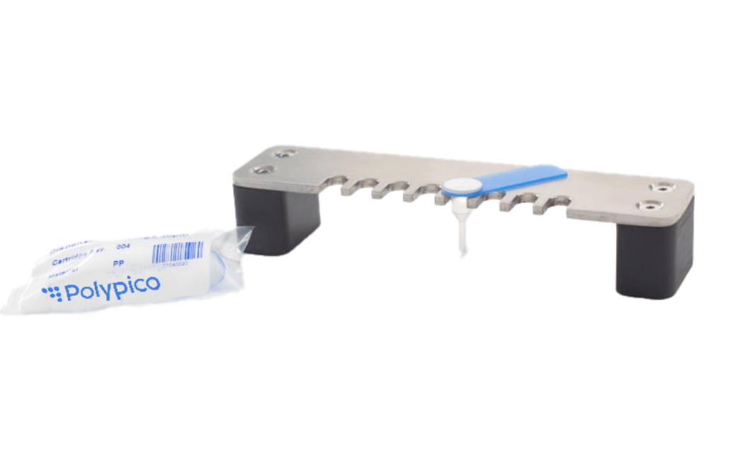 Filling bridge with a cartridge for microdispensing applications