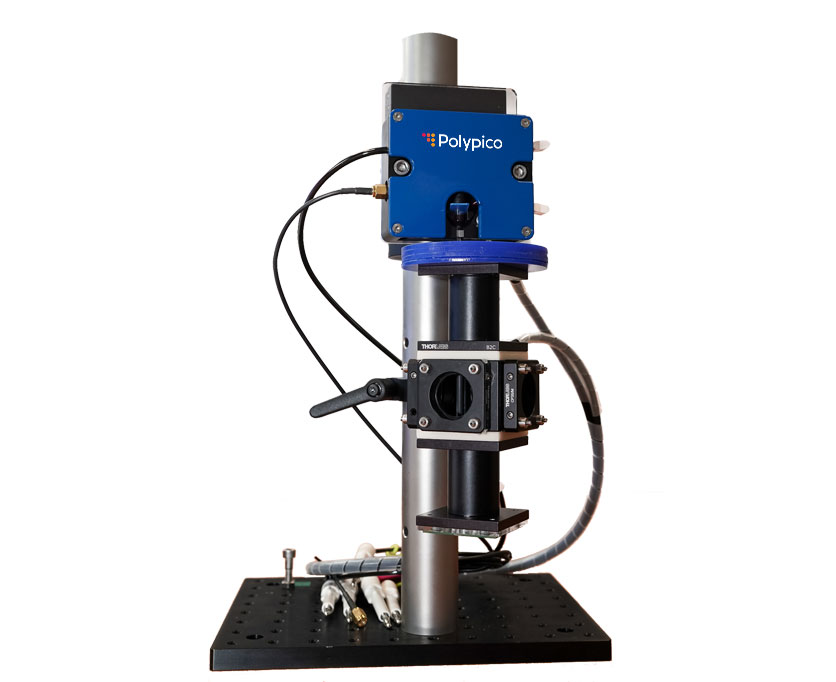 Microdispenser electrodynamic traps