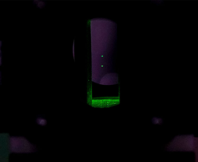 Droplet levitation at Electrodynamic Cage Traps