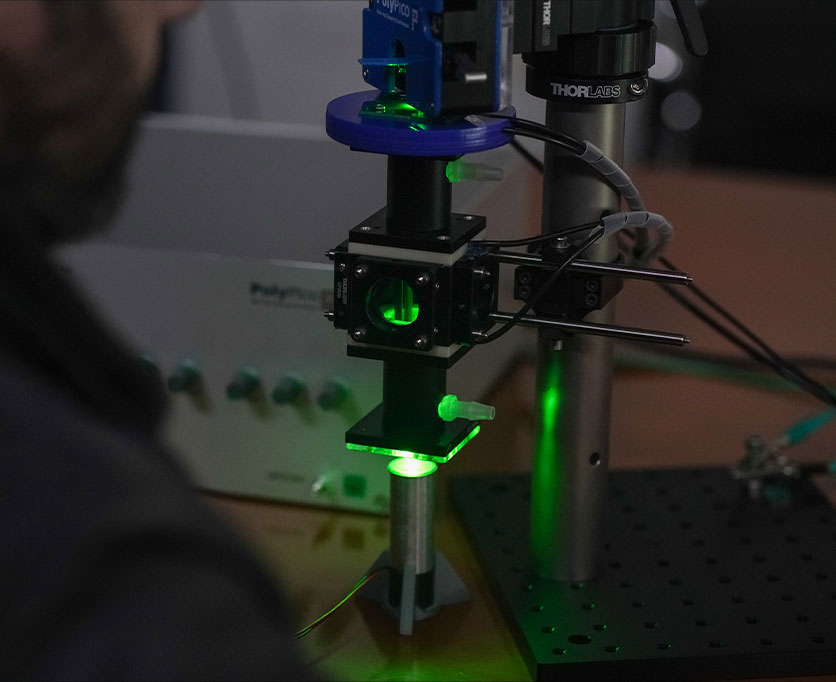 Electrodynamic Cage Traps with droplet levitation